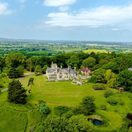 Rolling Stones Drummer Charlie Watts' Former Country Home Hits The Market For $15m